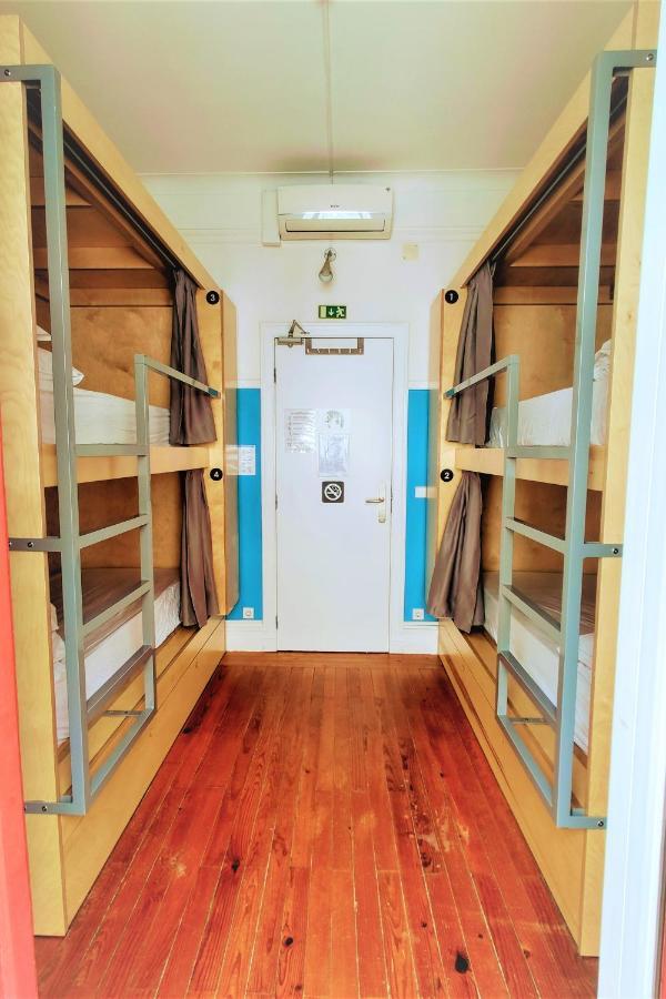Rivoli Cinema Hostel بورتو المظهر الخارجي الصورة A typical room at a youth hostel